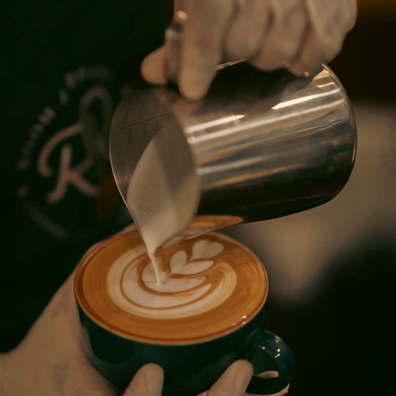 Latte art being poured