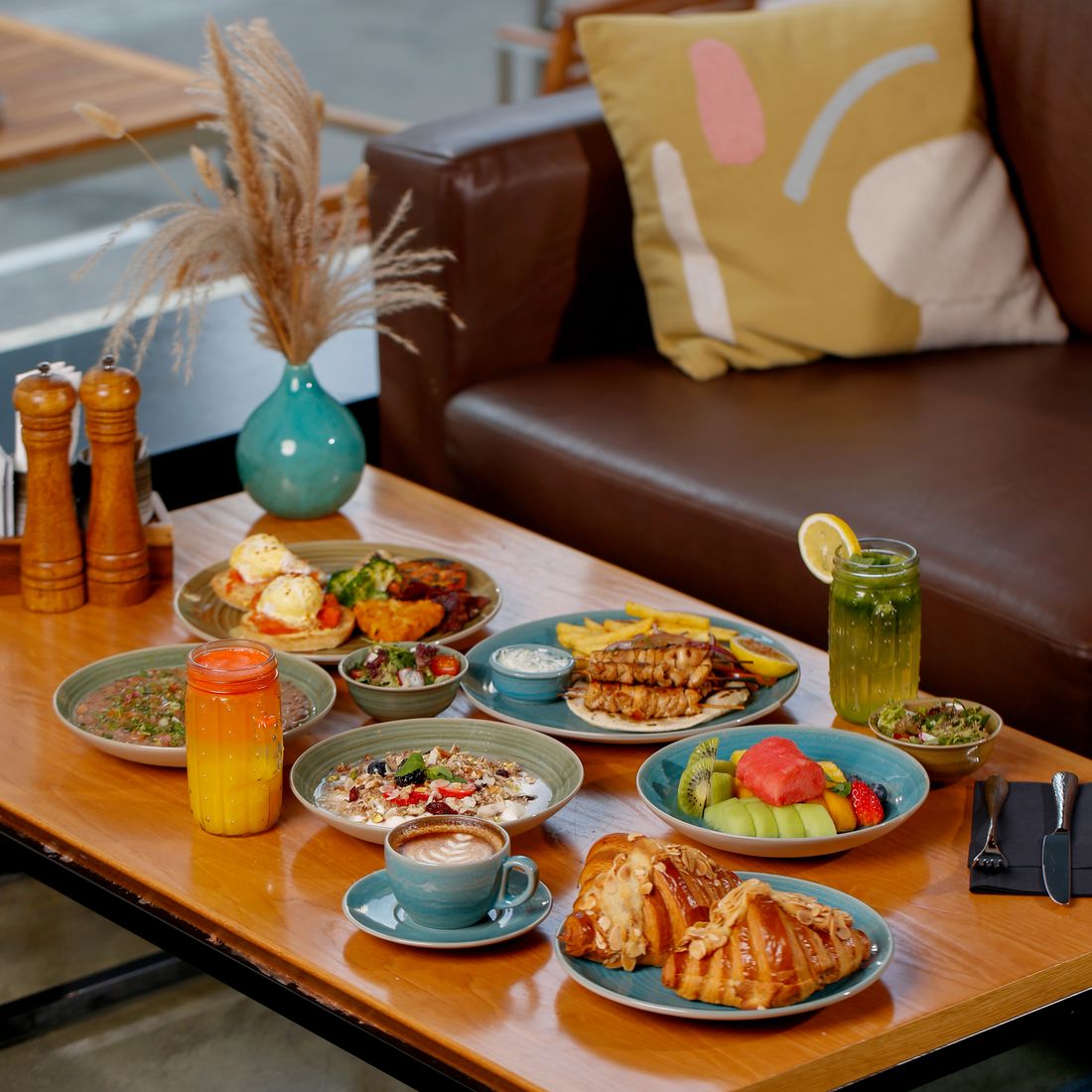 A table of brunch dishes and drinks